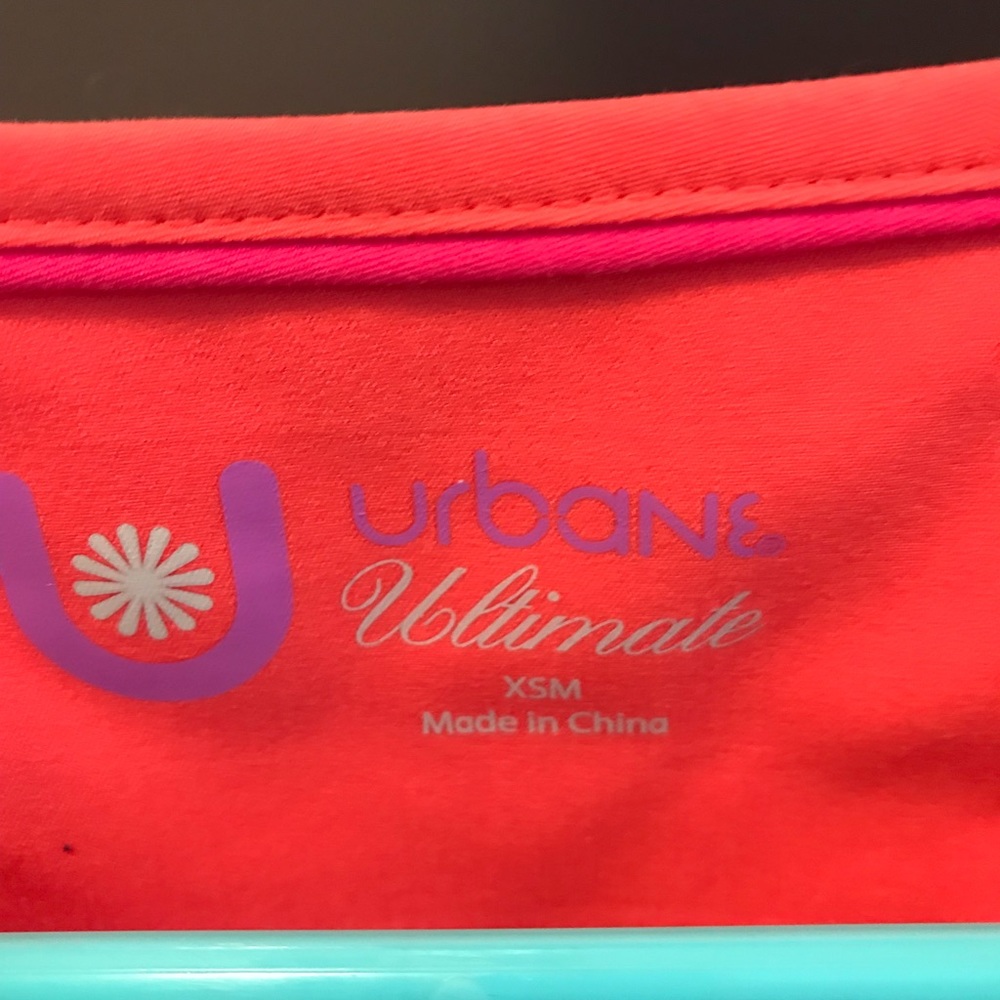 Women’s URBANE XS coral scrub top